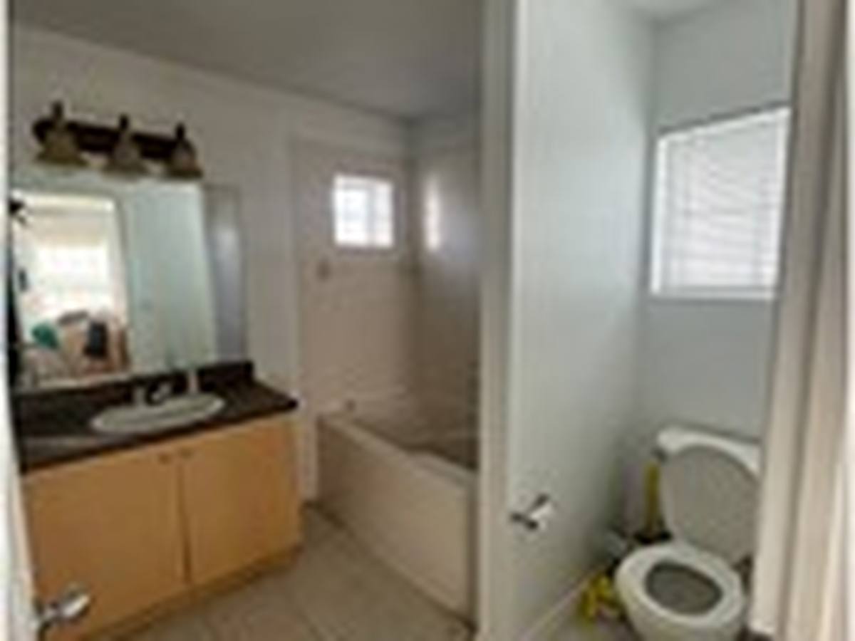 Before: Patterned-Tile Bath